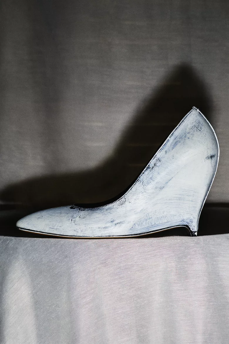 Model wearing platform pumps without a visible heel